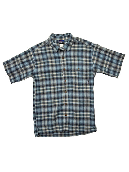 Plaid shirt with short sleeves on a white background